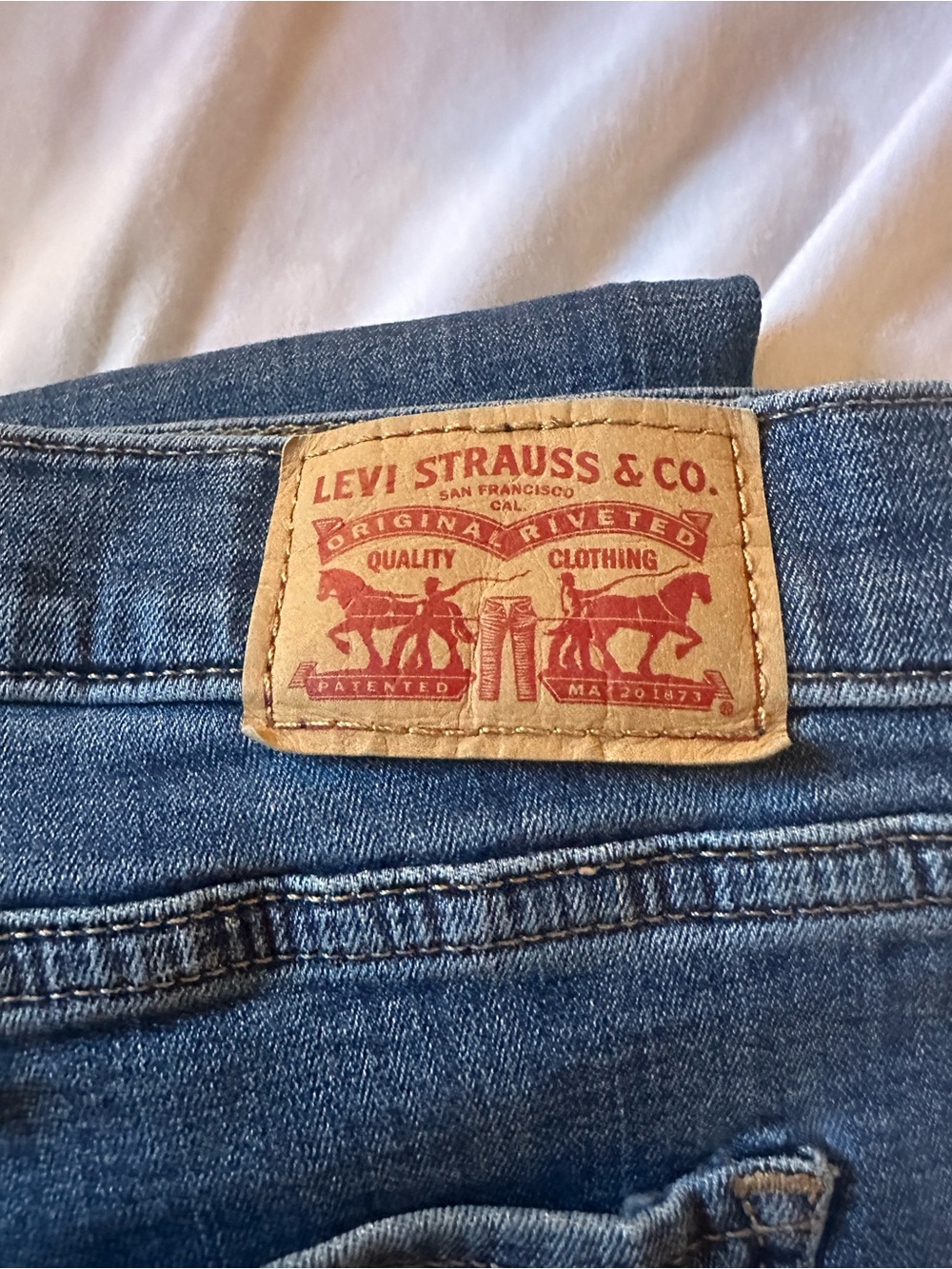 Levi's Ladies Dark Blue Slim Jeans with Tan Leather Patch